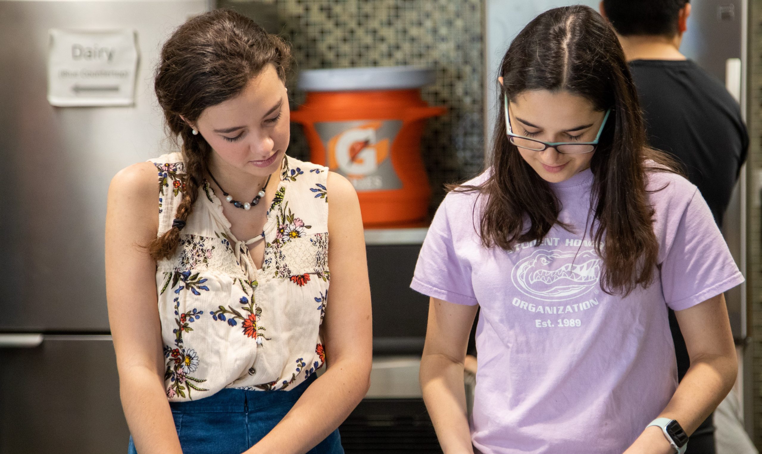 Two students try baking together.