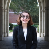 Professional headshot of Rachael Yacuzzo in the Sledd Archway.