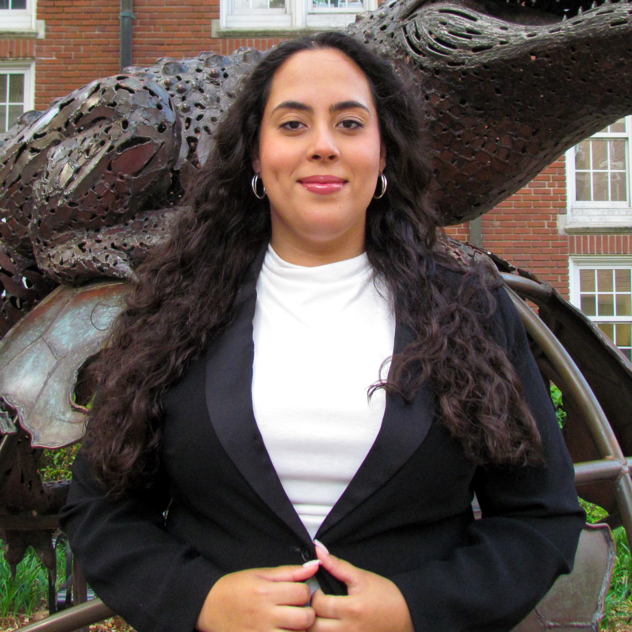 A headshot of IRHA communications coordinator Alyza Perez